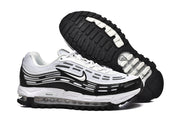 Nike Air Max 97 sneakers showing the side panels and black outsole.