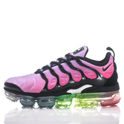 Side profile of pink Nike TN-21 sneaker with black overlays and multicolor sole