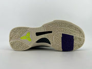 Full outsole view showing the tread pattern and colored inserts