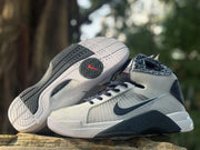 Nike HD2008 sneakers shown from the side and outsole, highlighting the black-and-white tread design.