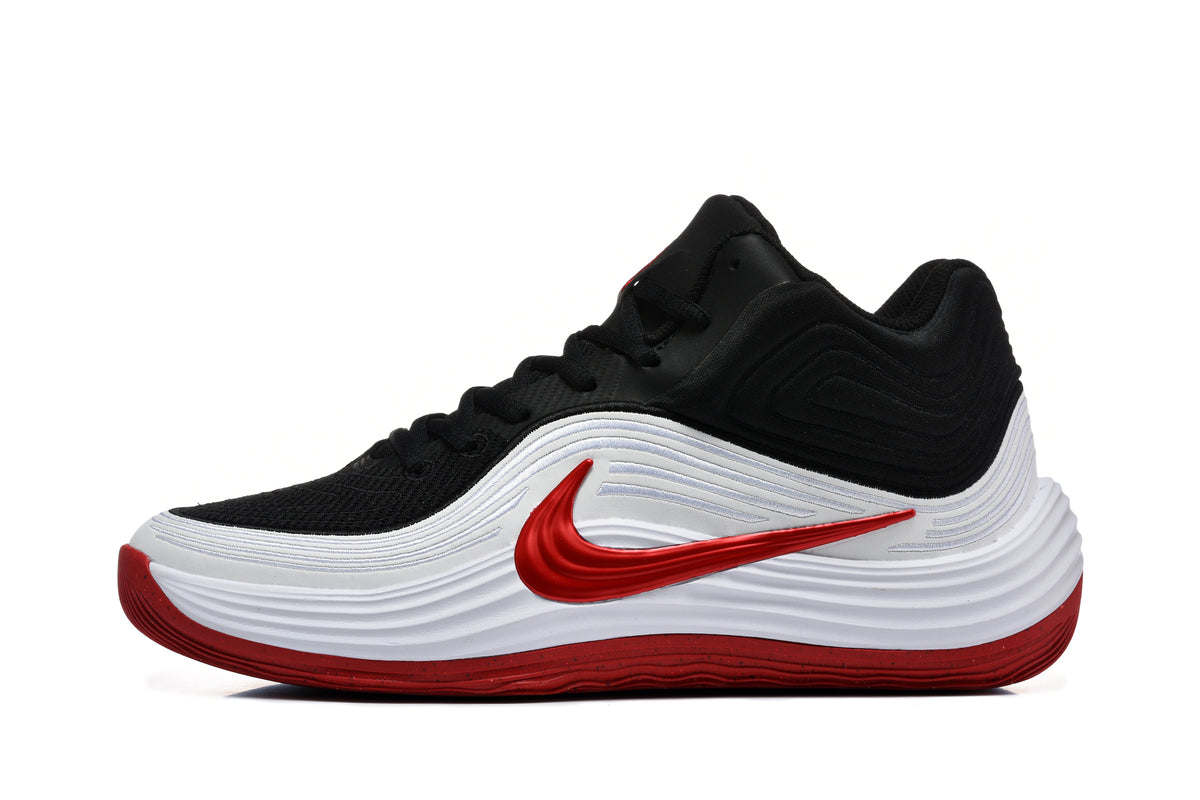 Side view of black, white and red Nike 998-1 sneakers