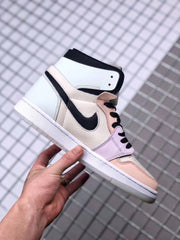 Side view of the high-top sneaker showing the pastel color blocking, black Swoosh, white midsole, and padded collar.