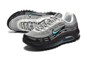 Pair of grey and black sneakers shown from above and at an angle