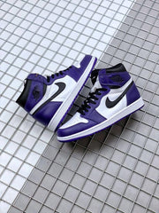 Pair of purple, white, and black high-top sneakers displayed on a metal grid surface.
