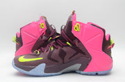 Side view highlighting the neon Swoosh, patterned upper, and bright pink ankle panel.