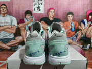 Rear view of the pair showing mint-green heel panels, grey collars, and white midsoles.