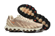 Side profile and outsole view of the beige Nike Air Max DN8 sneakers