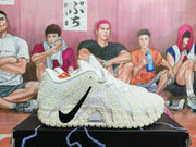 Side view of a white Nike shoe showing black Swoosh branding and ZoomX text near the sole.