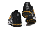 Rear and outsole views of black and yellow Nike Air Max Plus III sneakers.