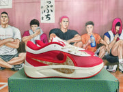 Side view of a white and red Anta KT 10 basketball shoe with patterned side panel