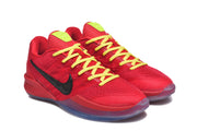 Three-quarter view of the red shoes with yellow laces and black side Swooshes.