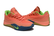 Pair of coral Nike S.T. Flare EP basketball shoes shown from a side and front angle.