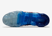 Underside view of the translucent sole with a gradient from clear to blue.