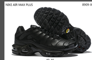 Black sneaker shown from the side and underside; image text reads Nike Air Max Plus.