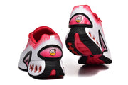 Rear and outsole views of red and white Nike Air Max sneakers