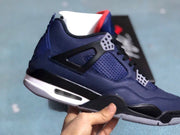 Close-up side view of the dark blue sneaker with black support cage and white midsole
