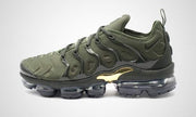 Side view highlighting the dark segmented sole and visible cushioning units.