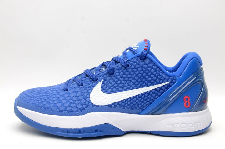 Side profile of blue Nike basketball sneakers with a white Swoosh, red number 8 detail, and white midsole.