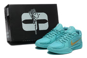 Aqua basketball shoes displayed in front of a black Sabrina-branded box.