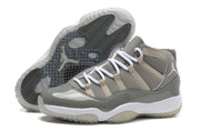 Gray and white high-top sneakers shown from the side and outsole view.