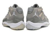 Rear view of the pair showing heel logos, gray collars, white midsoles, and translucent outsoles.